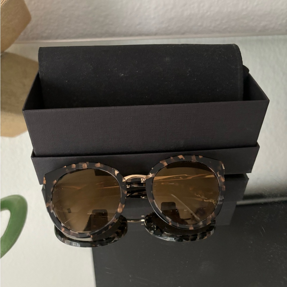 Dolce & Gabbanna sunglasses.